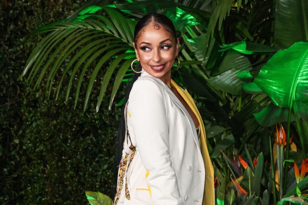 Mýa Posts Steamy, Red Catsuit That Drives Social Media In Frenzy